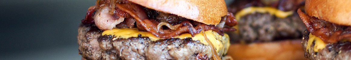 Eating Burger at Tam's Burgers restaurant in Lynwood, CA.